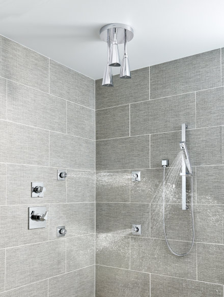 Delta Zura Collection Shower System with Ceiling Mount Rain Showerhead, Hand Sprayer, and Body Jets. Wall Sprays and Hand Shower Water On