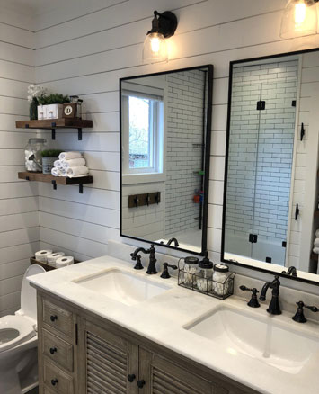 Double Sink Bathroom Vanity with Oil Rubbed Bronze Widespread Faucets Bronze Mirrors and Light Fixtures