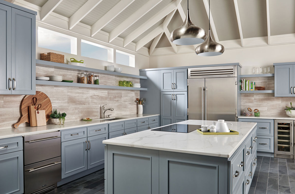 Light Blue Kitchen Cabinets with Stainless Steel Finish Faucet and Appliances